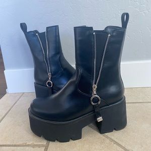 Lamoda “ain’t trippin” platform boots — pho leather, black zip up, size 7